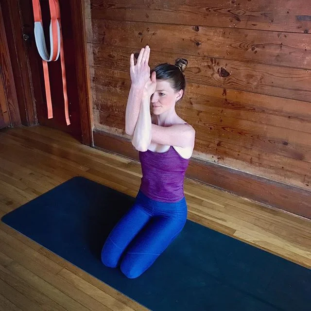 Garudasana (Eagle) arms, kneeling